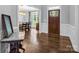 Welcoming entryway with hardwood floors and a view into the dining room at 270 Conifer Way, Shelby, NC 28150