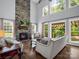Spacious living room with a stone fireplace and lots of natural light at 270 Conifer Way, Shelby, NC 28150