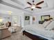 Spacious main bedroom suite featuring a tray ceiling, ceiling fan, and sitting area at 270 Conifer Way, Shelby, NC 28150
