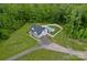 Stunning aerial view of a well-maintained property featuring a pristine pool and sprawling green lawns at 270 Worthington Dr, Mt Ulla, NC 28125