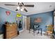 Bedroom featuring natural light, ceiling fan, and drum set at 270 Worthington Dr, Mt Ulla, NC 28125