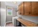Laundry room featuring washer, dryer, and butcher block folding table at 270 Worthington Dr, Mt Ulla, NC 28125