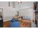 Spacious living room with a stone fireplace, wood floors, and cozy seating at 270 Worthington Dr, Mt Ulla, NC 28125