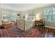 Comfortable bedroom with brass bed frame, large window, and decorative accents at 3040 Valencia Ter, Charlotte, NC 28211