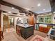 Elegant kitchen with a brick floor, featuring an island, stainless steel appliances, and rustic wood accents at 3040 Valencia Ter, Charlotte, NC 28211