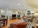 Comfortable living room showcasing a sofa, chairs, and an entertainment center at 3040 Valencia Ter, Charlotte, NC 28211