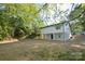 A charming two-story home with a spacious yard offers a blend of comfort and outdoor living at 307 N Catawba St, Lancaster, SC 29720