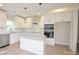 Modern white kitchen featuring a kitchen island, stainless steel appliances and ample storage at 307 N Catawba St, Lancaster, SC 29720