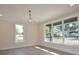 Sunlit Living Room with hardwood floors, recessed lights, and large windows overlooking the neighborhood at 307 N Catawba St, Lancaster, SC 29720
