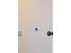 A close up of a wall with an outlet and door at 307 N Catawba St, Lancaster, SC 29720