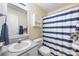 Bathroom featuring a vanity, toilet, medicine cabinet, mirror, and a shower with striped curtain at 311 Masters Dr, Rock Hill, SC 29732