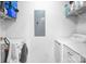 Functional laundry room with modern washer and dryer, complemented by shelving for storage at 311 Masters Dr, Rock Hill, SC 29732