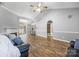 Bright living room with vaulted ceilings, a cozy fireplace, hardwood floors, and an open layout at 311 Masters Dr, Rock Hill, SC 29732