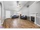Well-lit living area showcasing vaulted ceilings, hardwood floors, a cozy fireplace, and comfortable seating at 311 Masters Dr, Rock Hill, SC 29732