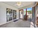 Inviting screened-in porch, perfect for outdoor dining, featuring a sliding door for easy access to the home at 311 Masters Dr, Rock Hill, SC 29732