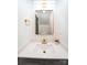 Stylish powder room featuring modern fixtures, a sleek vanity, and elegant decor, maximizing a small space at 3150 Driftwood Dr # B, Charlotte, NC 28205