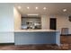 Spacious open kitchen with a large island and plenty of counter space for cooking and entertaining at 3150 Driftwood Dr # B, Charlotte, NC 28205