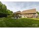 The backyard features a pergola with seating at 3186 Helmsley Ct, Concord, NC 28027