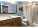 Bathroom featuring a vanity and tiled shower at 3186 Helmsley Ct, Concord, NC 28027