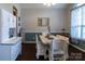 Charming dining area with modern table set, bright window, and stylish decor at 3186 Helmsley Ct, Concord, NC 28027