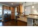Updated kitchen with stainless steel appliances, granite countertops, and generous storage at 3186 Helmsley Ct, Concord, NC 28027