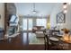 Inviting living room with stone fireplace, hardwood floors, and cozy furniture arrangement at 3186 Helmsley Ct, Concord, NC 28027