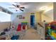Playroom featuring toys, access to the second floor, and neutral paint at 3186 Helmsley Ct, Concord, NC 28027