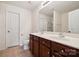 Bathroom featuring a double vanity, tile flooring, toilet, and a shower with glass door at 3512 Gibbon Terrace Ct, Charlotte, NC 28269