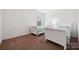 Well-lit bedroom with twin beds, carpeted floors, and natural light at 3512 Gibbon Terrace Ct, Charlotte, NC 28269