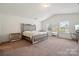 Spacious primary bedroom featuring vaulted ceilings and ample natural light at 3512 Gibbon Terrace Ct, Charlotte, NC 28269