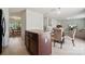 Kitchen with central island that opens to dining and living spaces at 3512 Gibbon Terrace Ct, Charlotte, NC 28269