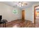 Bedroom with ceiling fan and hardwood floors at 393 Carson Dr, Gastonia, NC 28052