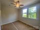 Bedroom features natural light from two windows and ceiling fan at 412 Nathaniel Way # Brx0052, Charlotte, NC 28213