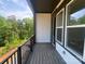 Relax on the balcony with nature views, offering a perfect spot for unwinding and enjoying the outdoors at 416 Nathaniel Way # Brx0051, Charlotte, NC 28213