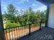 Enjoy serene views from the private balcony overlooking lush greenery, perfect for relaxation and outdoor enjoyment at 416 Nathaniel Way # Brx0051, Charlotte, NC 28213