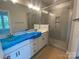 Bathroom boasts modern vanity and walk-in shower with tiled walls and glass enclosure at 416 Nathaniel Way # Brx0051, Charlotte, NC 28213
