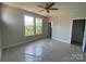This bedroom has a ceiling fan and multiple windows offering great natural light at 416 Nathaniel Way # Brx0051, Charlotte, NC 28213