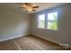 Bedroom featuring a ceiling fan and large windows for plenty of natural light at 416 Nathaniel Way # Brx0051, Charlotte, NC 28213