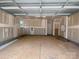 Spacious unfinished two-car garage with concrete flooring and ample room for storage or projects at 416 Nathaniel Way # Brx0051, Charlotte, NC 28213