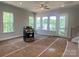 Bright living room with large windows offering scenic views, awaiting personal touches and stylish furnishings at 416 Nathaniel Way # Brx0051, Charlotte, NC 28213