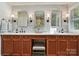 Bathroom with double vanity, modern fixtures, and ample counter space at 4701 Pineland Pl, Charlotte, NC 28277
