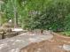 Brick patio with an outdoor table and chairs at 4701 Pineland Pl, Charlotte, NC 28277