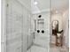 Modern shower featuring beautiful tile work and glass enclosure at 4701 Pineland Pl, Charlotte, NC 28277
