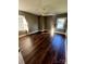 Bedroom with natural light, hardwood floors, ceiling fan, and neutral paint at 4905 Montibello Dr, Charlotte, NC 28226