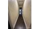 Hallway features wood-look flooring, textured walls, and access to the rest of the home at 4905 Montibello Dr, Charlotte, NC 28226