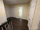 Second floor hallway with hardwood floors, white doors, and trim at 4905 Montibello Dr, Charlotte, NC 28226