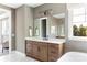 Elegant bathroom with dual sinks, a modern vanity, and ample counter space at 504 Meadow Ridge Dr, Belmont, NC 28012