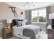 Inviting bedroom featuring stylish decor, a comfortable bed, and ample natural light at 504 Meadow Ridge Dr, Belmont, NC 28012