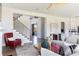 Bright living room with a modern staircase, and open entryway at 504 Meadow Ridge Dr, Belmont, NC 28012