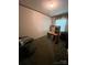 Bedroom featuring a desk with shelves and a window at 515 Willow St, Lincolnton, NC 28092